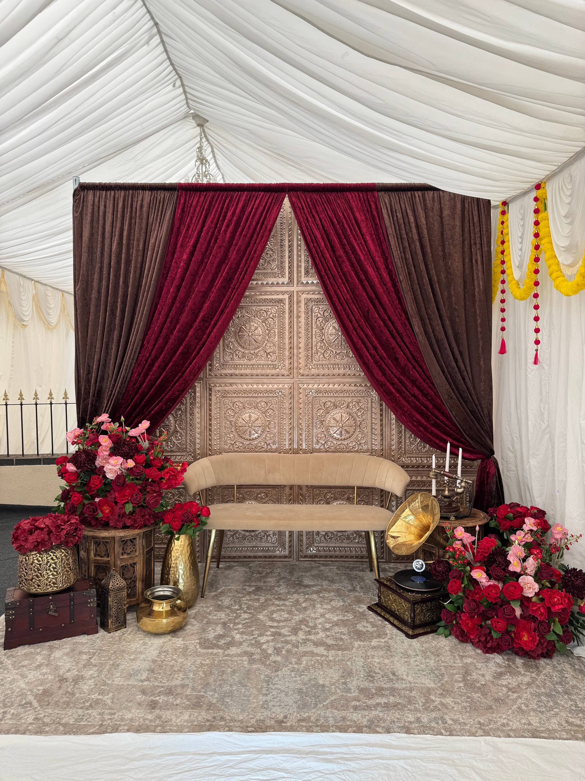 Vintage-inspired wedding backdrop and stage styling by Sajaavat Events, Birmingham, Midlands UK